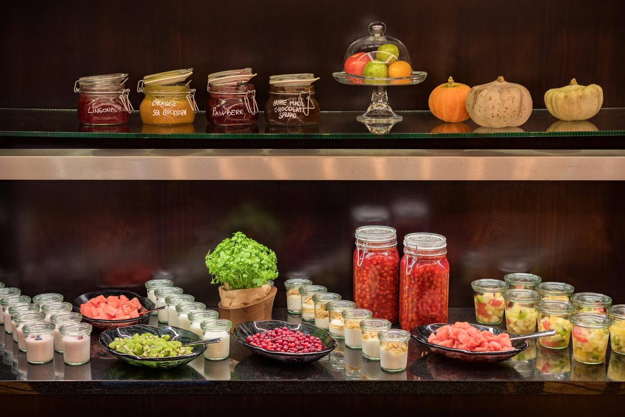 Grand Hotel Kempinski Rīga Exterior foto A selection of jams and fruit preserves